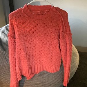 Coral crew neck women’s sweater. Very soft, and comfortable.